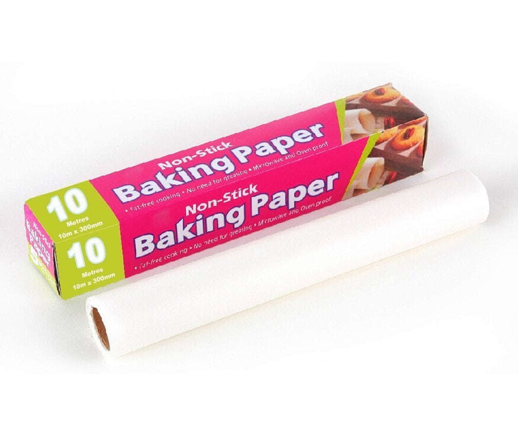 A roll of white baking paper with a pink and green box on a white background.