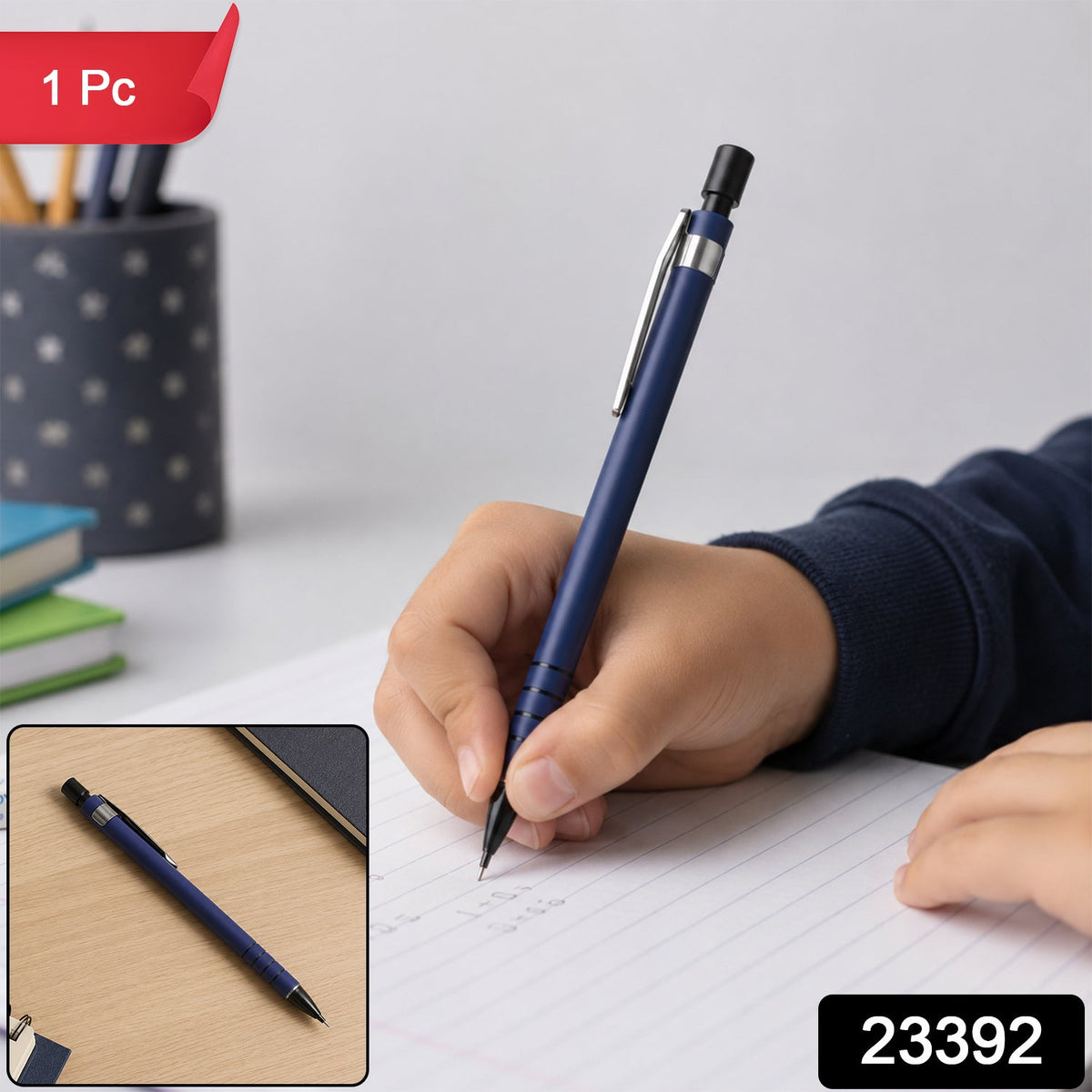 A child's hand writes with a blue mechanical pencil on lined paper, with a smaller inset image of the pencil on a – view 2