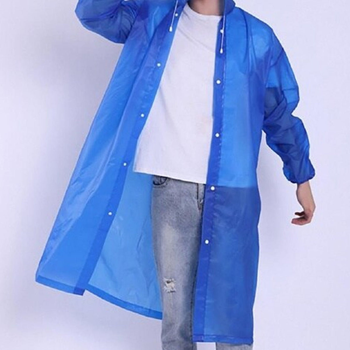 A man in a blue EVA raincoat, with the front unbuttoned to show a white shirt and jeans underneath.