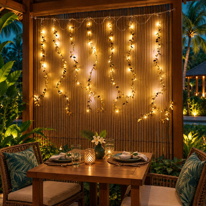 Leaf curtain lights behind a decorated table