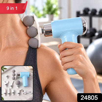 A person uses a light blue massage gun with three grey spherical heads on their shoulder, with a red "9 in 1" label.