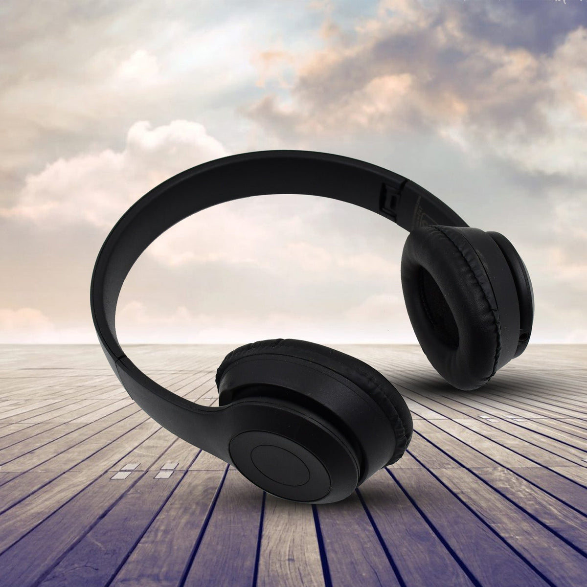 Stylish black foldable wireless headphones with cushioned earcups.