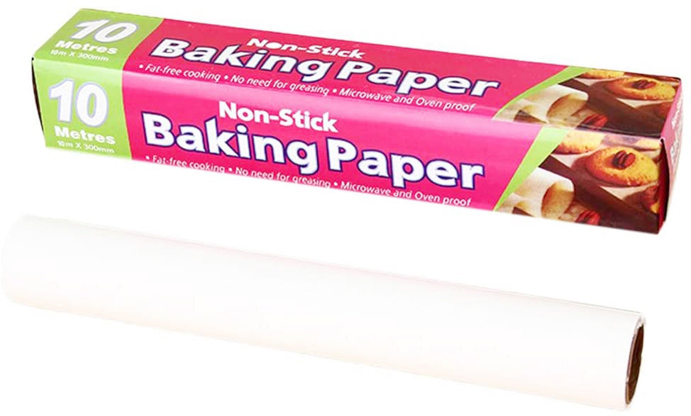 A pink and green box of non-stick baking paper next to a roll of white baking paper.