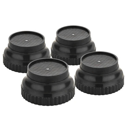 Four black round washing machine support legs with textured tops are arranged in a square on a white background.