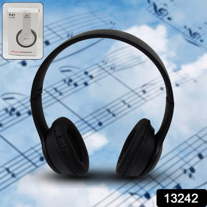 Side view of ergonomic wireless over-ear headphones in black.