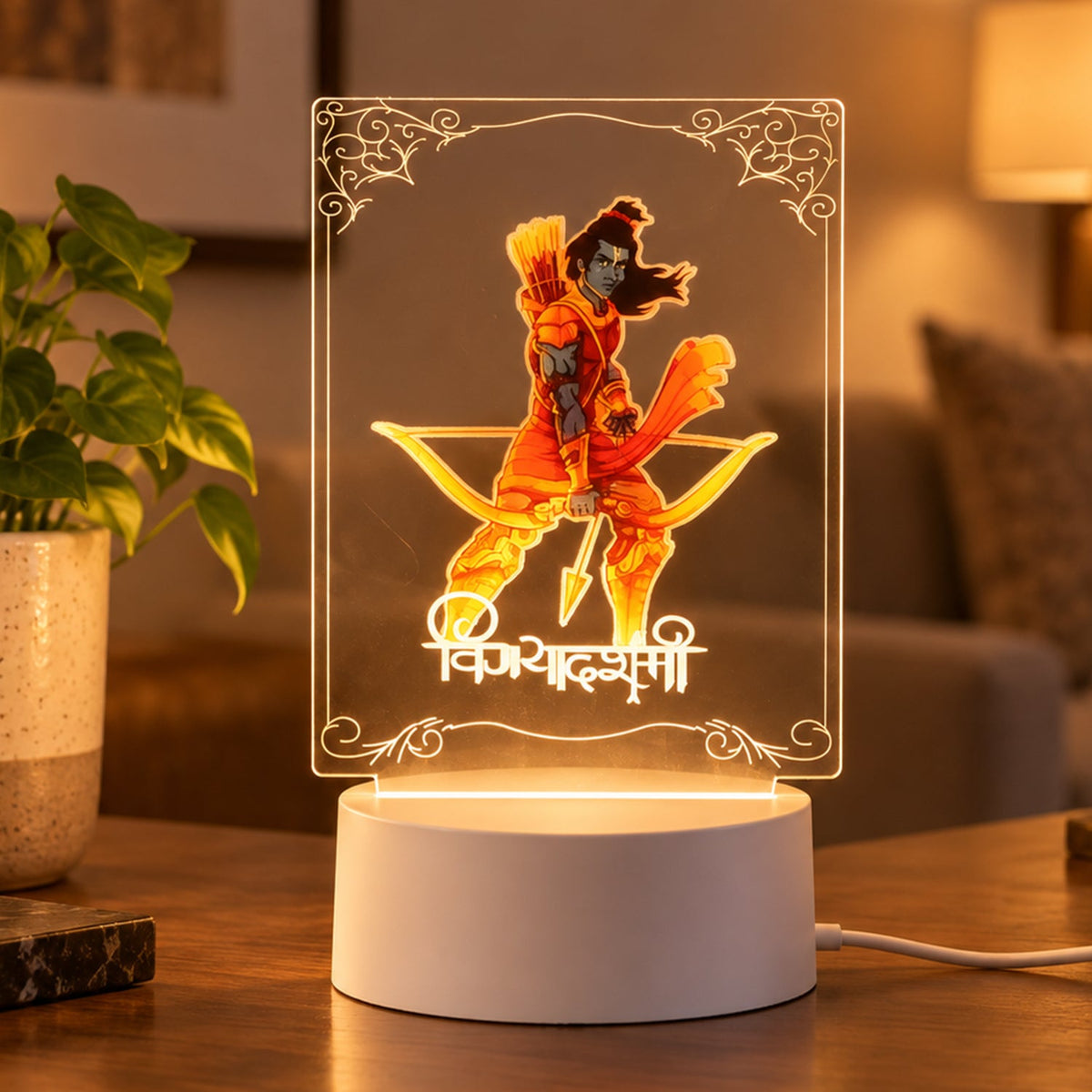 Illuminated Lord Ram 3D LED lamp with an orange glow, featuring a deity holding a bow and arrow, on a wooden table.