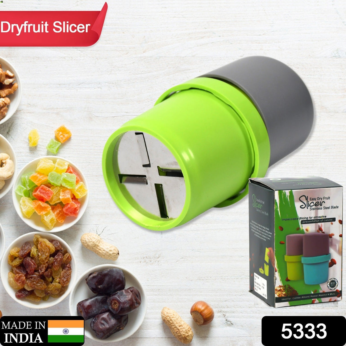A green and gray dry fruit slicer is surrounded by various dry fruits and nuts, with product packaging on the right.